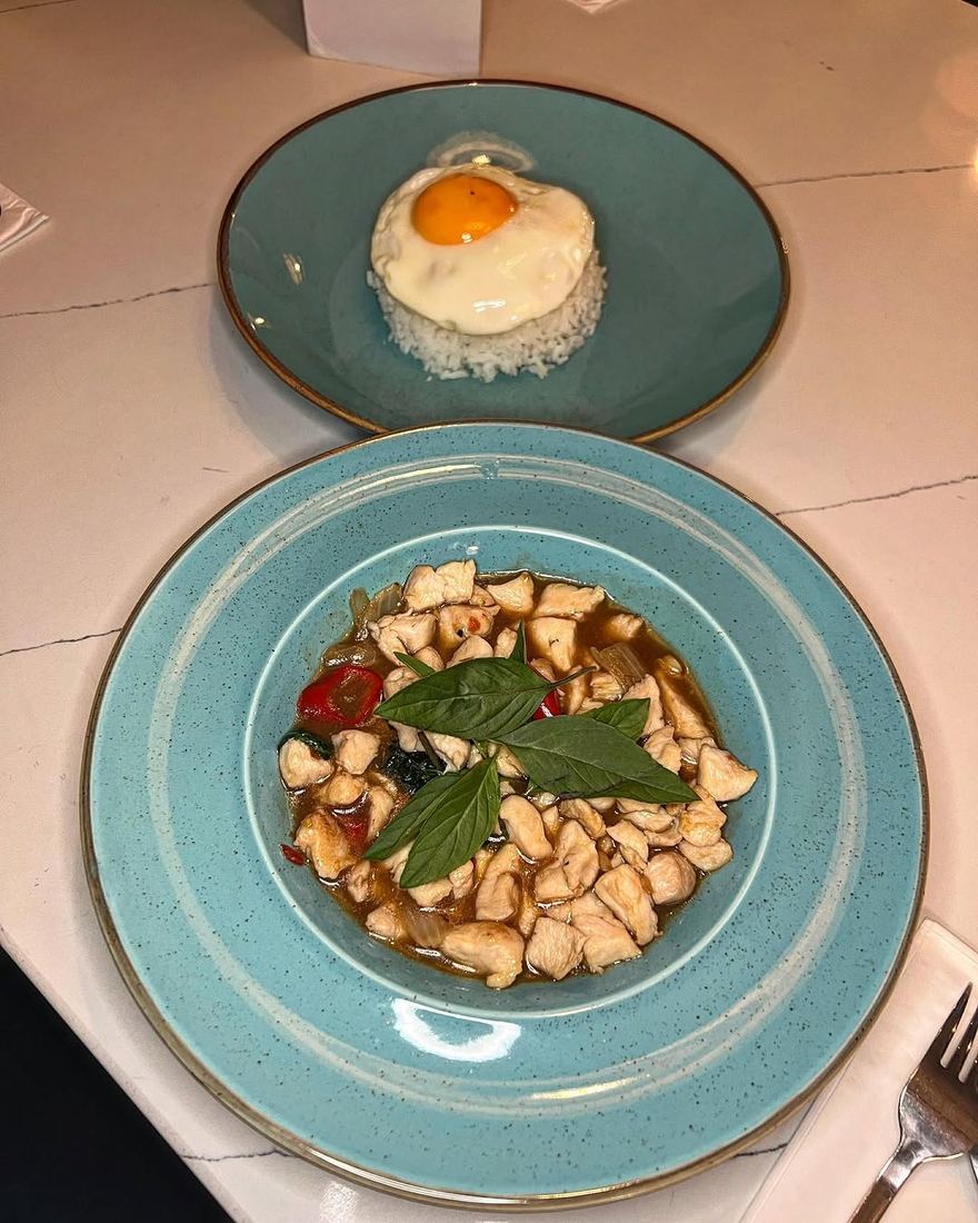Chicken holy basil with jasmine rice and a crispy fried egg