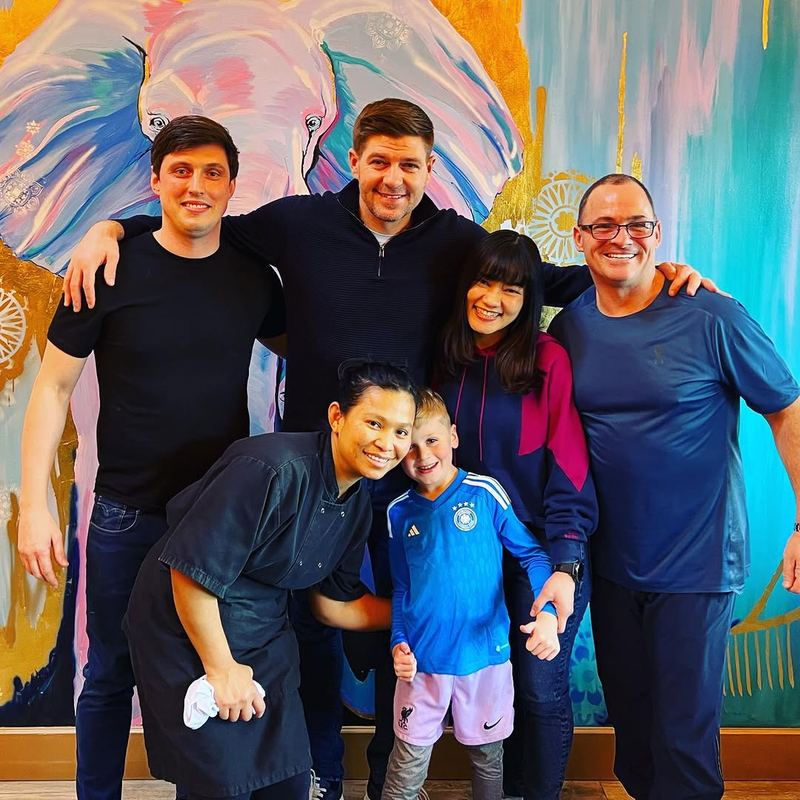 Steven Gerrard with the May's Thai family
