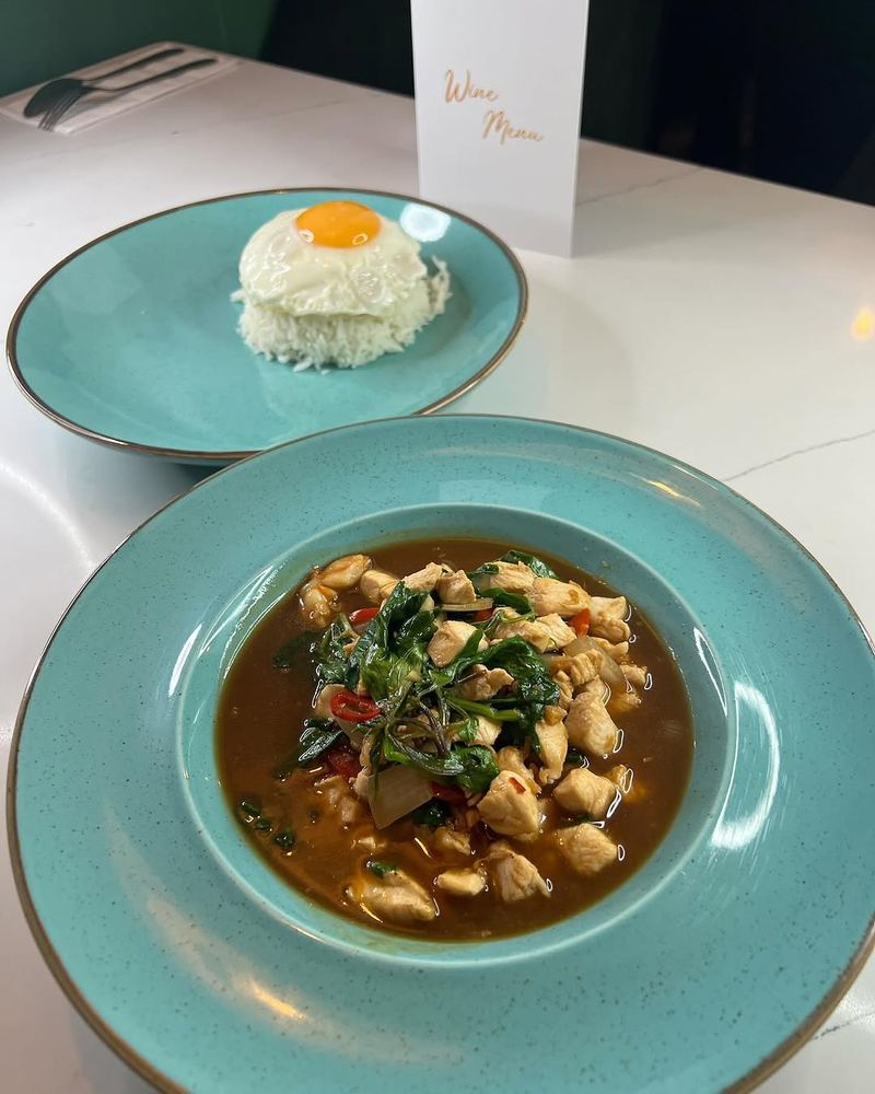Chicken and prawn holy basil with rice and egg