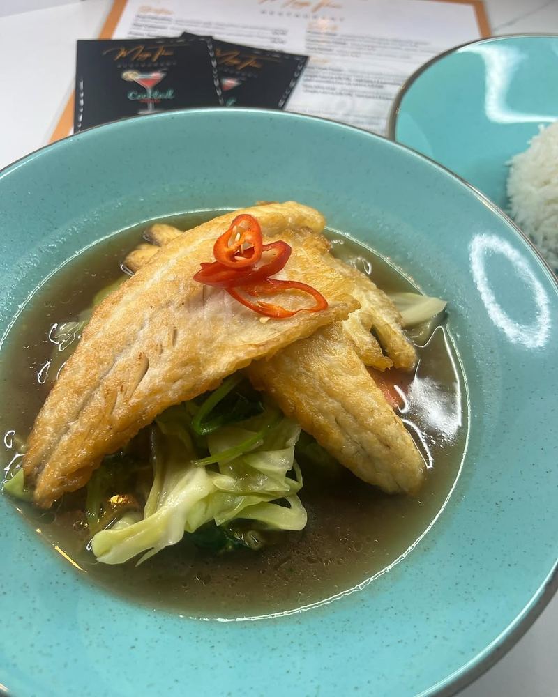 Crispy seabass fillets with mixed vegetables